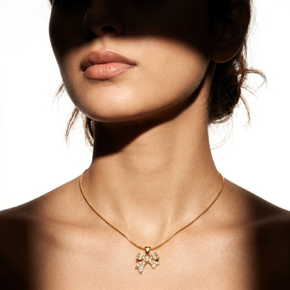 Pave Crystal Bow Pendant Snake Chain Necklace – 18K PVD Gold Plated